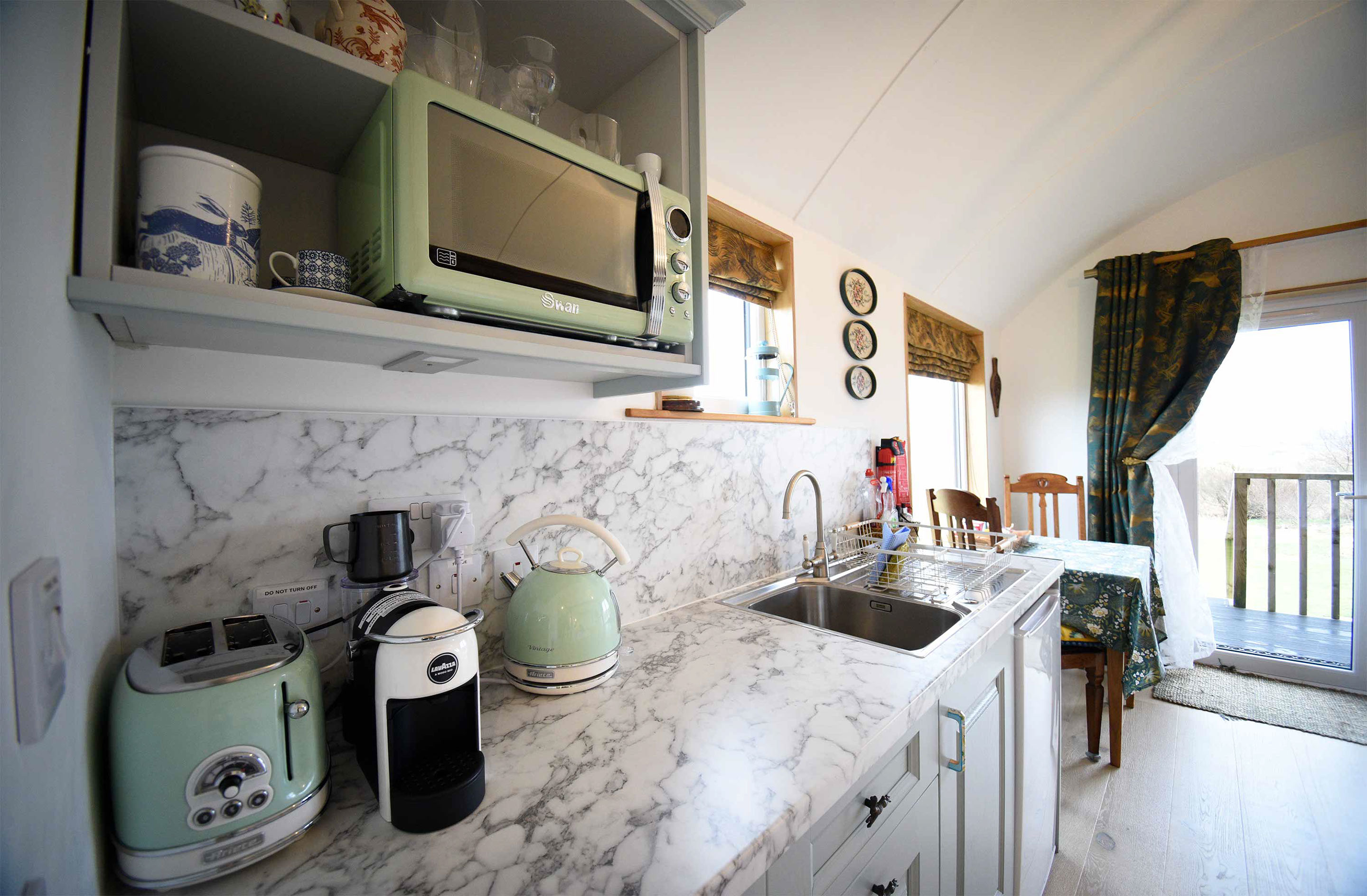 The Coach House self catering accommodation at Araucaria Croft Skye contains a modern kitchen